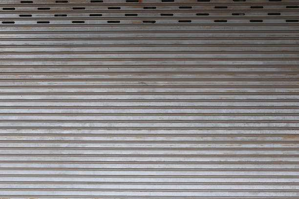 istock Old steel door weathered and rusty background. 580128312