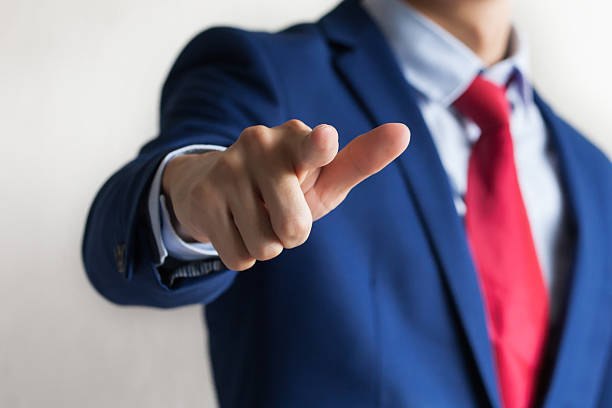 Confident business manager pointing forward as We Want You gesture Confident business manager pointing at camera as We Want You gesture - indicates company looking for new employees i want you stock pictures, royalty-free photos & images
