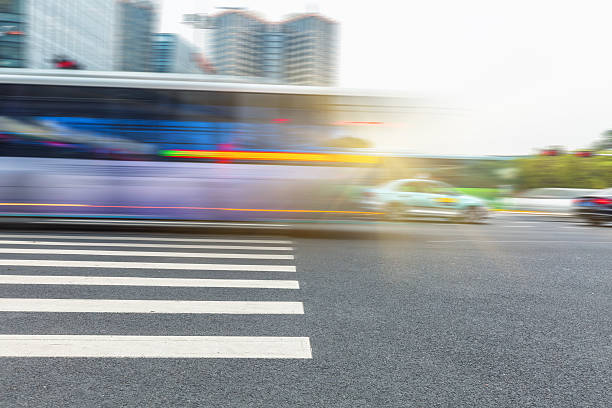 istock car driving on road in city 580132468