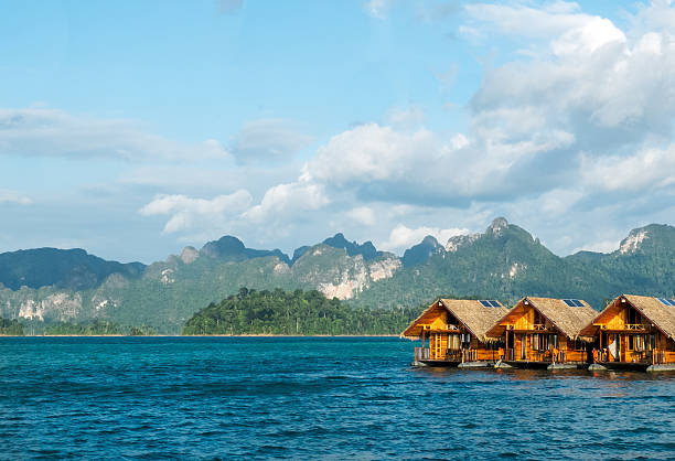 istock Beautiful Wooden Floating House in Ratchaprapa dam 580135252