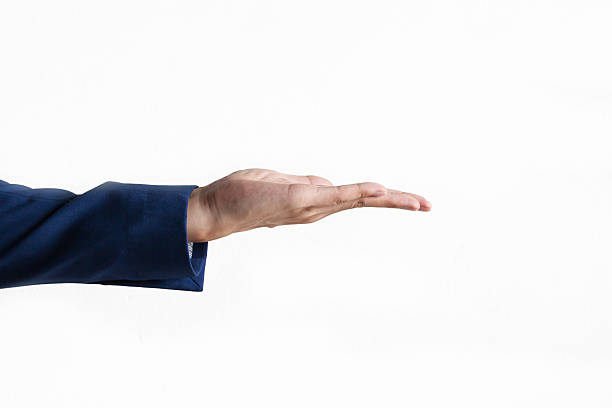 istock Businessman's hand on product presentation gesture 580135440