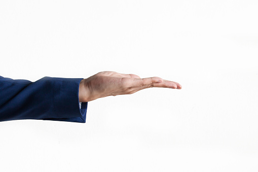 Businessman's hand on product presentation gesture in white isolated background