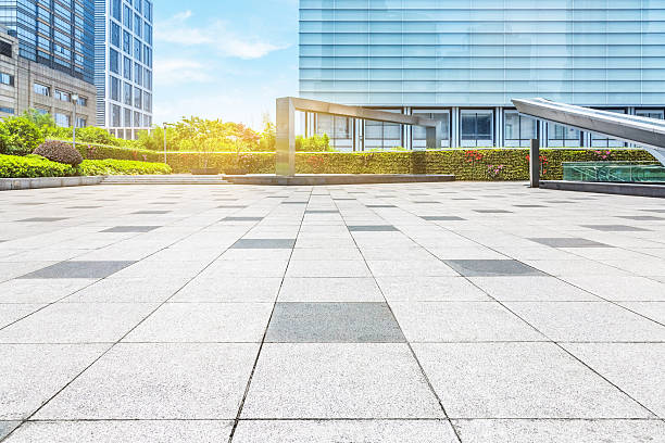 istock empty pavement and modern buildings in city 580135740