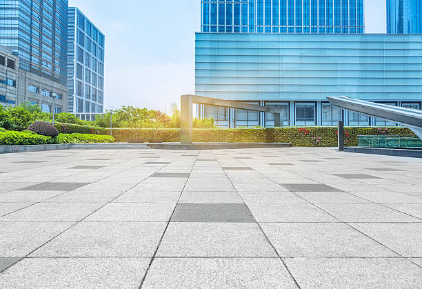 istock empty pavement and modern buildings in city 580136004