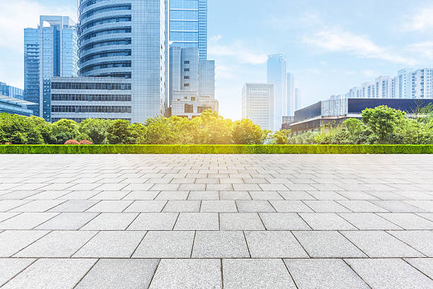 istock empty pavement and modern buildings in city 580136208