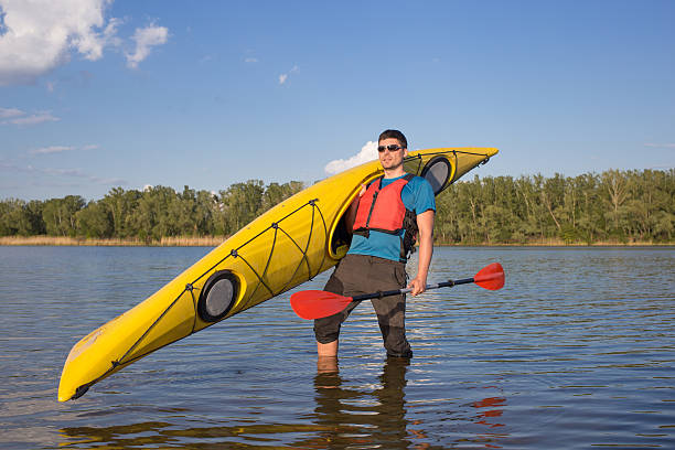 istock Man traveling on the river in a kayak 582257956