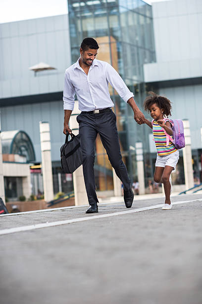 istock Hurry up baby, we are going late! 582258036