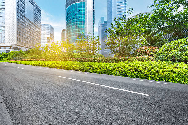 istock empty road front of modern buildings 582259118