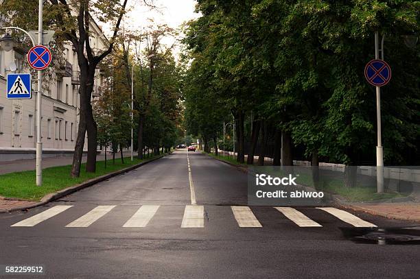 Crosswalk And City Street With Alone Car Stock Photo - Download Image Now - Crosswalk, No People, Street