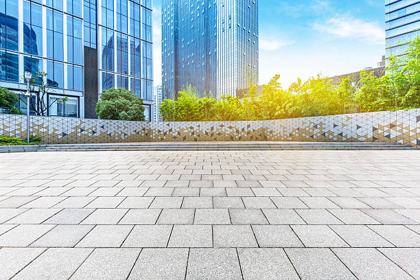 istock empty pavement and modern buildings in city 582259532