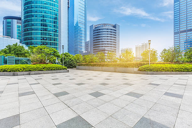 istock empty pavement and modern buildings in city 582259608