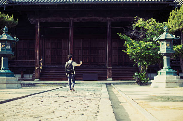 istock Traveler checked the map using a smartphone 582260560