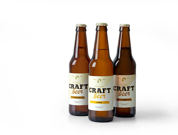 Craft beer bottles Three bottles with craft beer on white, white fake label craft beer stock pictures, royalty-free photos & images