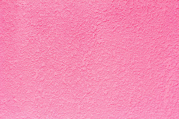 istock Pink grunge cement wall, textured background 582262216