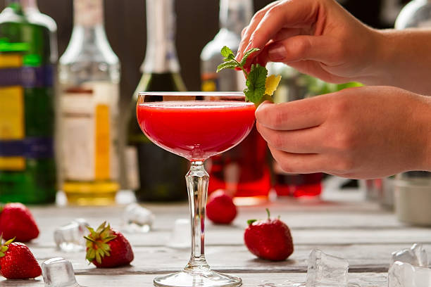 istock Coupe glass with red cocktail. 582262890