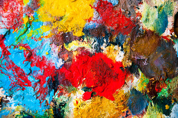 istock Oil paints multicolored closeup abstract background 582263484