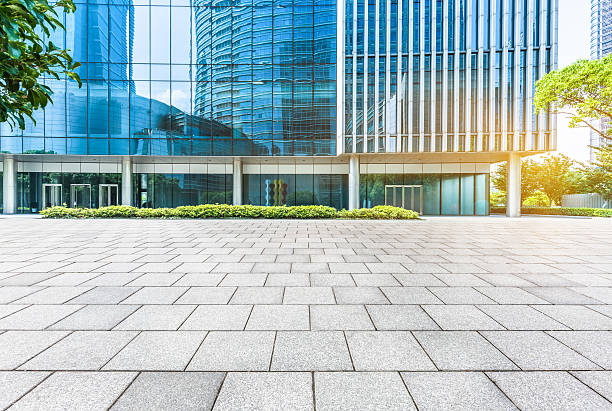 istock empty pavement and modern buildings in city 582263748