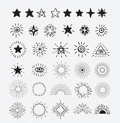 Set Of Vintage Sunburst and stars.  Hand-Drawn Vector Hipster Design Elements on the textured background.