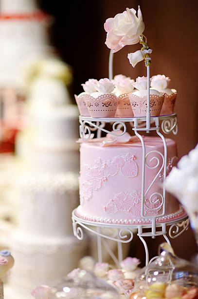 istock White wedding cupkace cake decorated with flowers 582269908