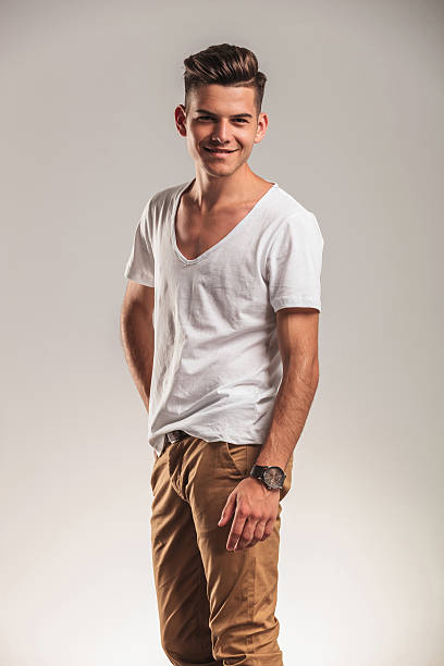 istock stylish young man looking at the camera 582270966