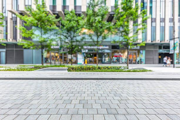 istock empty pavement and modern buildings in city 582273846
