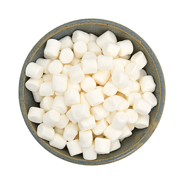 istock Small marshmallows in an old stoneware bowl 582274750