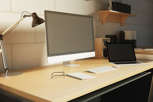 istock Computer monitor and laptop side 582275394