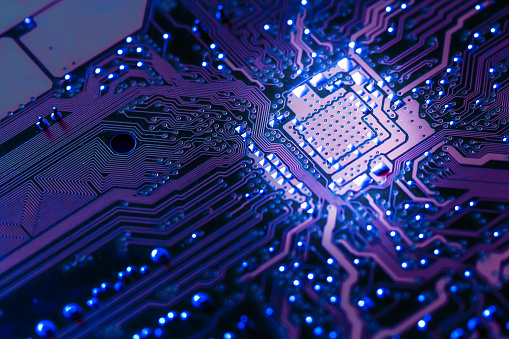 Closeup electronic circuit board background.