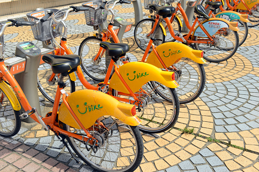 Taipei, Taiwan - July 2, 2016: U Bike, a Bicycle share program in Taipei, gives residents and tourists one more transportation option and reduces the consumption of fossil fuels.