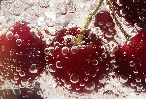 istock Cherry in soda water with bubbles 582278520