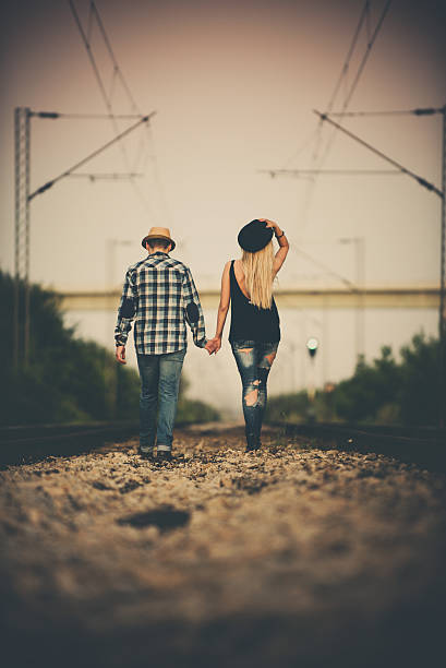 istock Young couple urban exploring 582278922