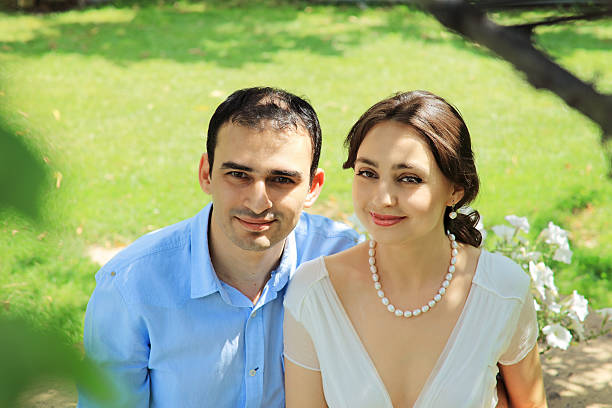 Bride and groom in a garden