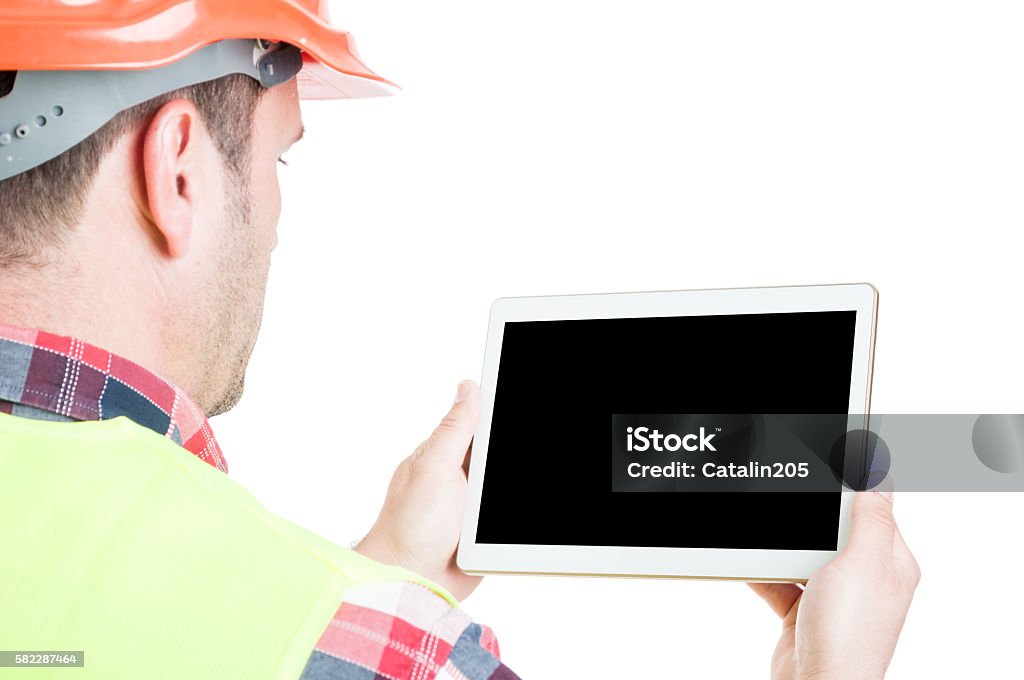 Männlicher Builder mit digitalem Tablet - Lizenzfrei Bauarbeiter Stock-Foto