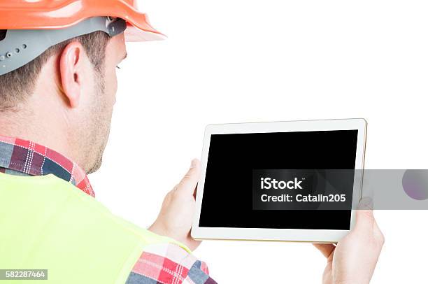Männlicher Builder Mit Digitalem Tablet Stockfoto und mehr Bilder von Bauarbeiter - Bauarbeiter, Tablet PC, Tablet benutzen
