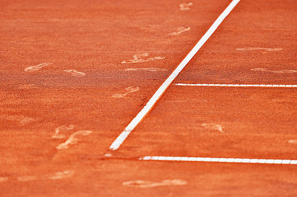 istock Footprints on tennis clay court 582287908
