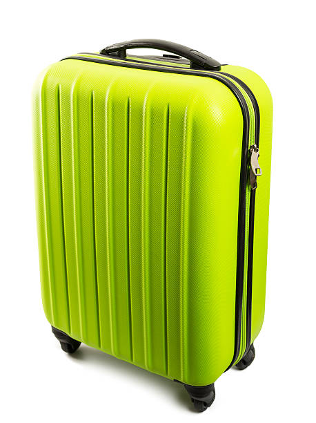 istock Modern green travel suitcase isolated on white background 582291322