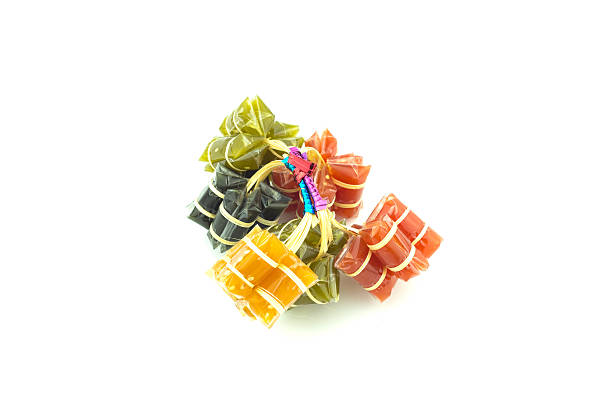 istock Caramel - Thai caramel candy on white background 582291968