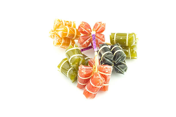 istock Caramel - Thai caramel candy on white background 582292044