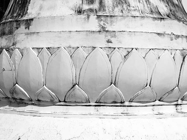 Temple architecture details white lotus base in Uthai Thani, Thailand