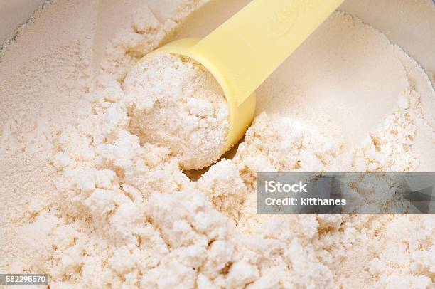 Baby Milk Powder In Cans That Open With A Spoon Stock Photo - Download Image Now - Ground - Culinary, Baby - Human Age, Healthy Eating