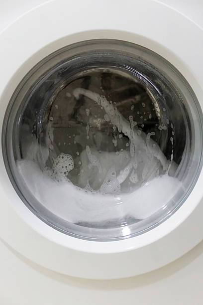 istock White washing machine with a lot of foam 582298272