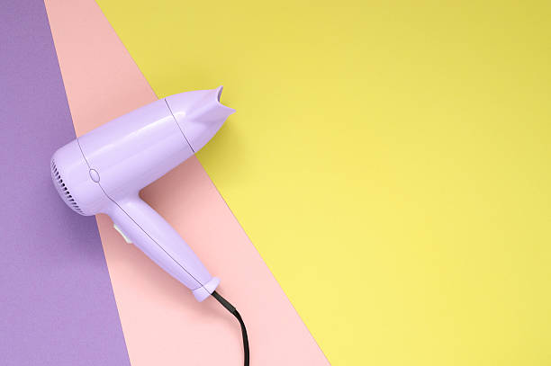 Purple Hair Dryer On Colorful Paper Background Stock Photo - Download Image  Now - Hair Dryer, Cable, No People - iStock