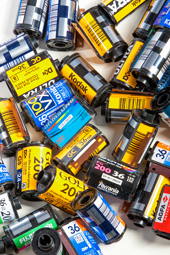 Minsk, Belarus-May 30, 2015: Bulk Variety of Old Photo Films Cassettes of Different World Leading Manufacturers Placed in Heap Together against White Background shot in Studio on May 30, 2015 in Minsk, Republic of Belarus