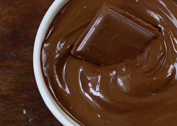 istock Chocolate spread ganache in bowl for breakfast and dessert 582299344