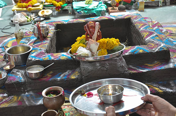 istock Men Doing Pray Of Lord Ganesha 582300052