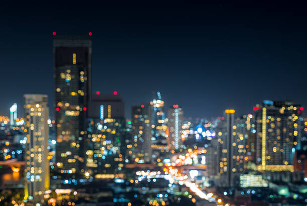 istock Blurred abstract background lights, beautiful cityscape view. 582300416