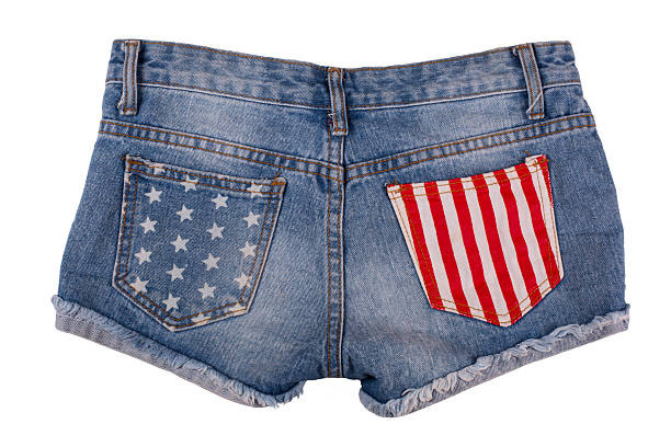istock Ripped handmade jeans shorts isolated on white background. 582300670