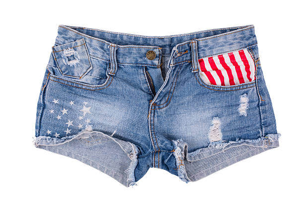 istock Ripped handmade jeans shorts isolated on white background. 582300832