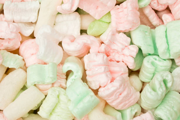 istock Pink, White and Green Packing Peanut Foam 582301230