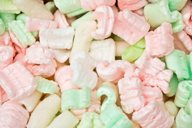 istock Pink, White and Green Packing Peanut Foam 582301996